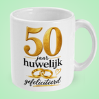 Mok 50 jaar huwelijk ‘Gefeliciteerd’ met trouwringen